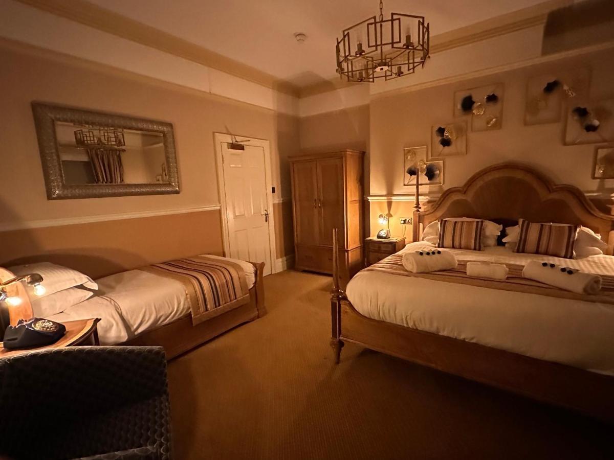 Chester House Guest House Esterno foto A bedroom at the hotel